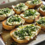 Delicious bruschetta with a golden crust and a generous spread of garlic herb goat cheese.