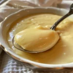 Rich, velvety vanilla pudding displayed in an elegant serving dish.