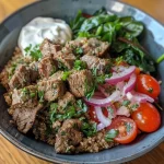 Close-up of a vibrant Lamb Quinoa Bowl with colorful ingredients.