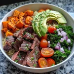 A close-up view of a Beef Protein Bowl featuring colorful ingredients.