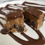 Close-up view of chocolate-covered banana bites filled with peanut butter.