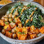 A vibrant bowl of Kale and Sweet Potato Brown Rice, featuring colorful chunks of sweet potato and fresh greens.
