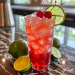 ['Close-up view of a Cherry Limeade drink with ice and sliced limes.', 'Side perspective of a refreshing Cherry Limeade featuring cherries and lime slices.', 'Juicy Cherry Limeade presented with crushed ice and maraschino cherries.', 'Vibrant Cherry Limeade drink with lime and cherries, captured in detail.']