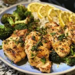 ['Close-up view of Lemon Broccoli & Herbed Chicken with brown rice penne on a plate.', 'Side view of a colorful dish featuring Lemon Broccoli, Herbed Chicken, and brown rice penne.', 'Juicy Lemon Broccoli paired with Herbed Chicken and brown rice penne, captured in a detailed shot.', 'Tasty Lemon Broccoli and Herbed Chicken served with brown rice penne, displayed from the side.']