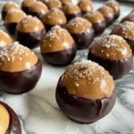 Close-up of Buckeyes, showing a rich chocolate coating.